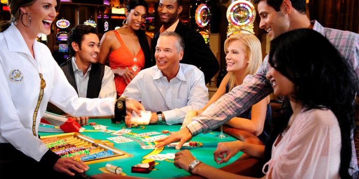Full table of Blackjack players at Caesars Palace Casino Las Vegas.