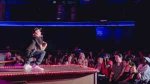 A comedian on the stage at AC Jokes Comedy Club Tropicana Atlantic City