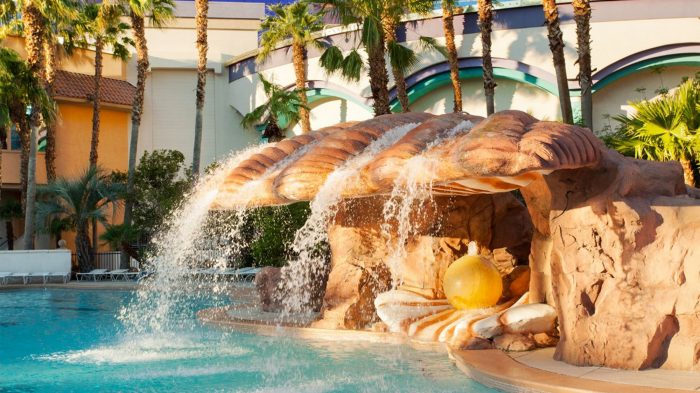 pool at rio with a shell rock waterfall