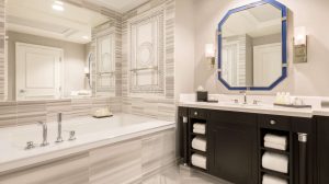Interior view of the restroom with large vanity and over sized bathtub
