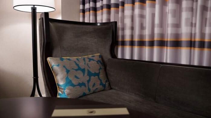 julius deluxe room couch closeup