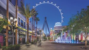 View Of The Promenade Area Outside Showing Store Fronts And Fountains Leading Up To The High Roller At The Linq Las Vegas