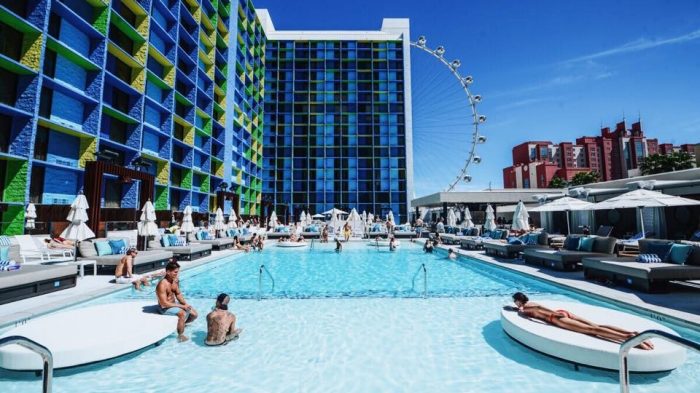 Photo Of The Pool During The Day With Guests Swimming And Lounging And The High Roller In Back Ground At The Linq Las Vegas