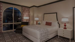 Image Of Standard King Guest Room At The Paris Hotel Las Vegas Showing Bed, Night Stand, Lounge Chair And Open Window