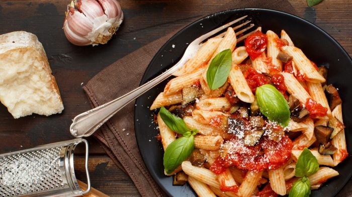 Penne pasta with onion and fresh parmesan