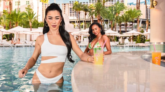 Two women holding drinks at Go Pool at Flamingo Las Vegas
