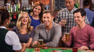 Photo Of A Group Of People Playing Playing Blackjack At O'Sheas Bar At The Linq Las Vegas