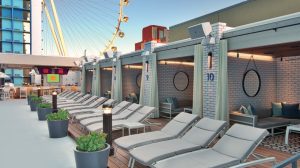 Cabanas and daybeds lined up at the pool.