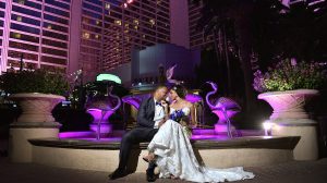 Photo Of Bride And Groom Sitting By A Fountain At Flamingo Las Vegas