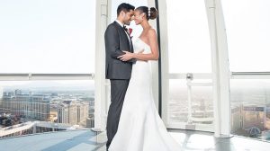 Photo Of A Bride And Groom Holding Each Other Inside The High Roller At The Linq