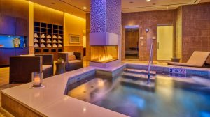 Beautiful soaking tub area with fireplace.