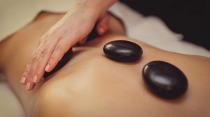 Women receiving hot stone massage