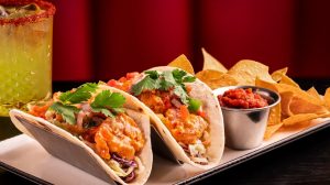 Sizzle & Salt shrimp tacos, chips and salsa