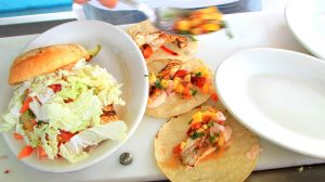 Image Of Fish Tacos And Fish Sandwich From The Blind Tiger Inside Harrah's Gulf Coast