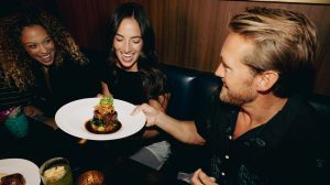 Guests dining at Hell's Kitchen at Caesars Republic Lake Tahoe