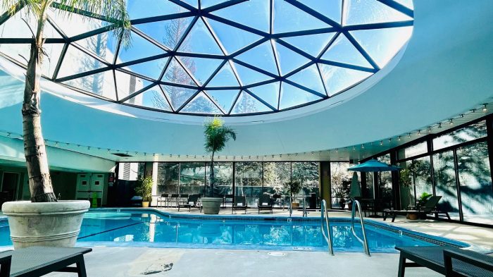 Harrah's Lake Tahoe indoor pool with dome ceiling and lounge chairs.