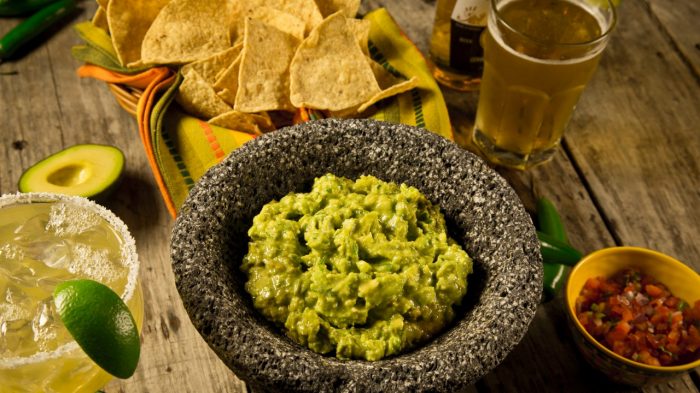 Photo Of a Margarita, Guacamole, Chips , Salsa, And Beer
