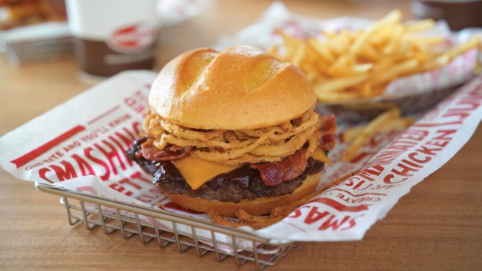 Bacon cheeseburger and fries at Smashburger.