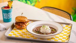 NOR Nina's Creole Cottage chicken sandwich, red beans and rice