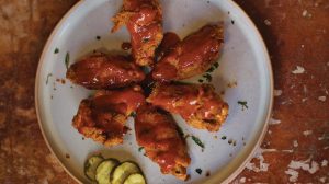 NOR Nina's Creole Cottage chicken wings with sauce