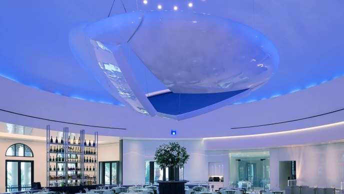 image Image sourced from: Caesars Palace https://www.caesars.com/content/dam/empire/clv/restaurants/mr-chow/1920x1080/mrchow-dining-room-ceiling-moon-art-1920x1080.jpg.transform/featured-img/image.jpg