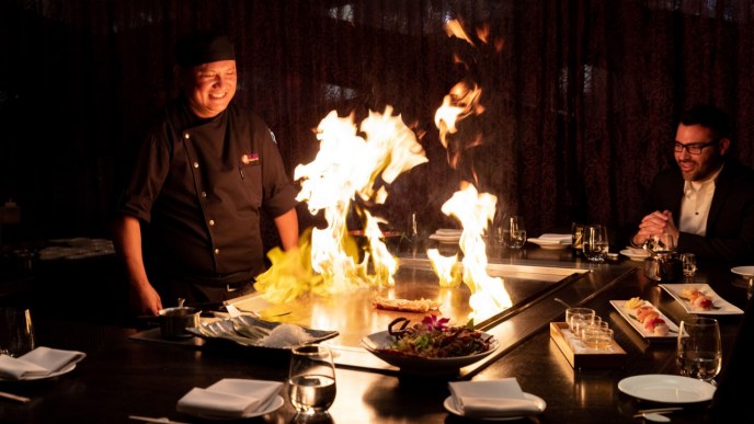 Image sourced from: Caesars Palace https://www.caesars.com/content/dam/empire/clv/restaurants/nobu/1920x1080/clv-nobu-teppanyaki-chef-lifestyle-1920x1080.jpg.transform/featured-img/image.jpg