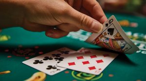 Photo of Person Holding Two Aces Photo of Person Holding Two Aces