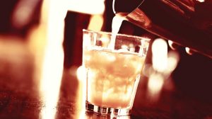 Drink being poured from a shaker.