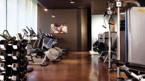 Interior of the fitness center with workout equipment.