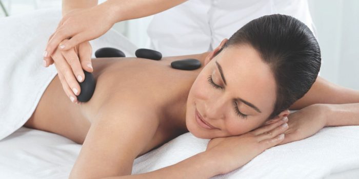 spa woman stones massage