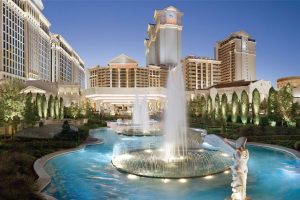 Exterior View Of Caesars Palace Las Vegas Property Showing A Waterfall And Statues Exterior View Of Caesars Palace Las Vegas Property Showing A Waterfall And Statues