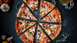 Pizza sliced up.