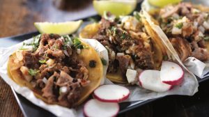 3 street tacos on a platter.