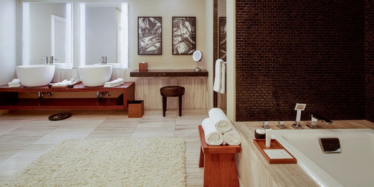 An opulent marble bathroom with a spa tub in a Caesars Palace suite